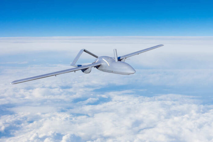Unmanned,Aerial,Vehicles,Spy,In,The,Sky,Flying,Over,Dense