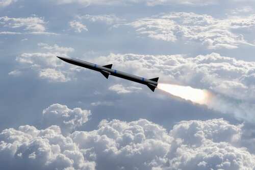 A,Combat,Rocket,Is,Flying,Above,The,Clouds,,Smoke,And