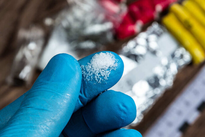 Evidence,Of,Smuggling,Traffic:,Drug,Powder,In,The,Hand,Of