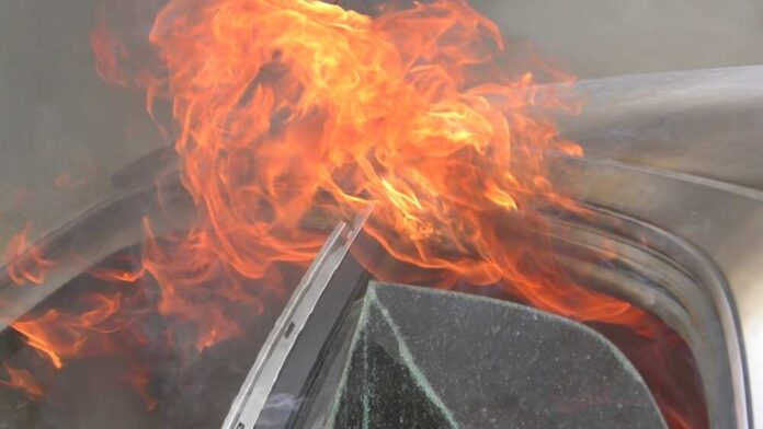 A,Car,Is,Burning,After,An,Accident,,Crash,,No,One
