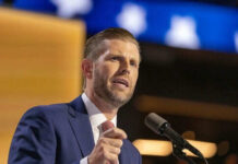 AI Drone Giant Emerges – Eric Trump’s Surprising Role Man in suit speaking at a microphone indoors
