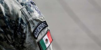 Close-up of a military uniform sleeve featuring the Mexico flag
