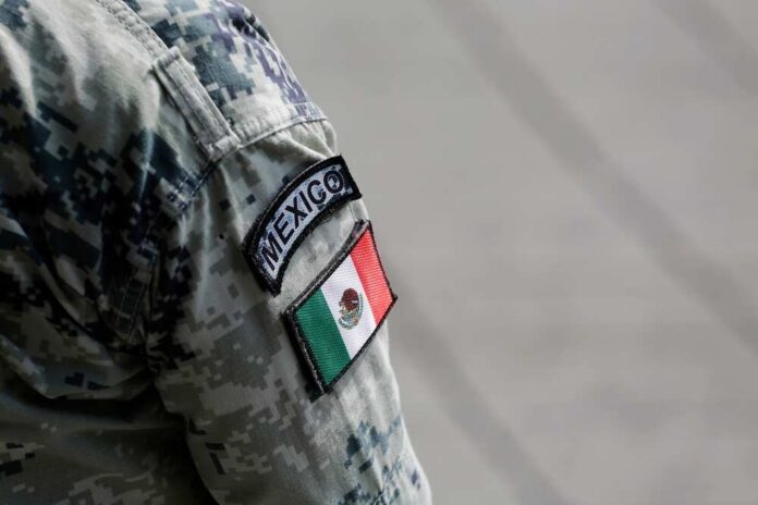 Close-up of a military uniform sleeve featuring the Mexico flag