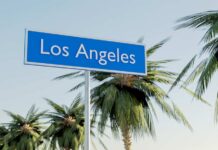 Grassroots Theater Shakes Up LA’s Art Scene Sign indicating Los Angeles surrounded by palm trees