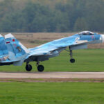 Sukhoi Su-30 jet taking off from a runway