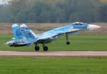 Sukhoi Su-30 jet taking off from a runway
