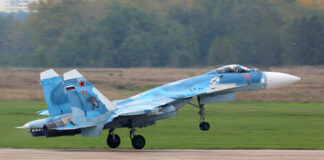Sukhoi Su-30 jet taking off from a runway