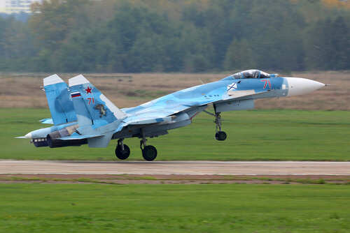 Sukhoi Su-30 jet taking off from a runway