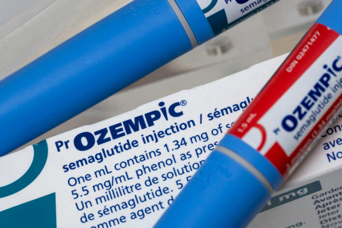 Ozempic syringe and box with dosage information