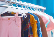 Lead-Laden Shirts: Urgent Warning for Parents A variety of children's clothing hanging on a rack