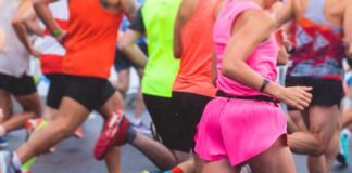 Runners in colorful athletic wear participating in a race