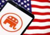 Smartphone displaying the Republican Party logo in front of an American flag