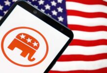Smartphone displaying the Republican Party logo in front of an American flag