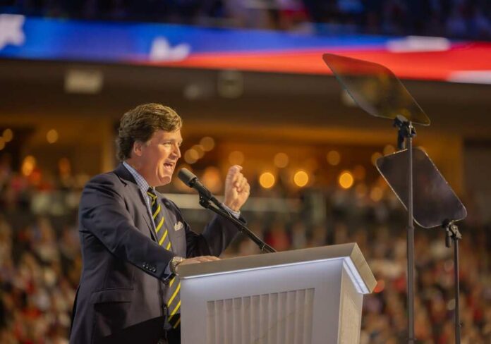 A speaker passionately addressing an audience from a podium