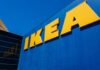 IKEA store exterior with large yellow signage against a blue background