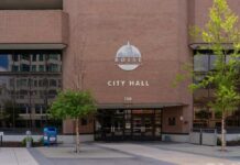 Exterior view of Boise City Hall with signage