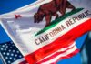 California Republic flag waving alongside the American flag against a blue sky