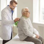 GRANDPARENTS at Risk: Deadly Lung Reaction Exposed Doctor examining an elderly patient in a bright medical office