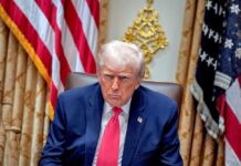 Trump’s Bold Blockade: Oil Prices on Edge Donald Trump seated in the Oval Office with a serious expression