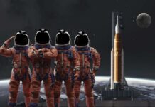 Four astronauts in orange suits standing in front of a rocket with the moon in the background