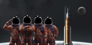 Four astronauts in orange suits standing in front of a rocket with the moon in the background