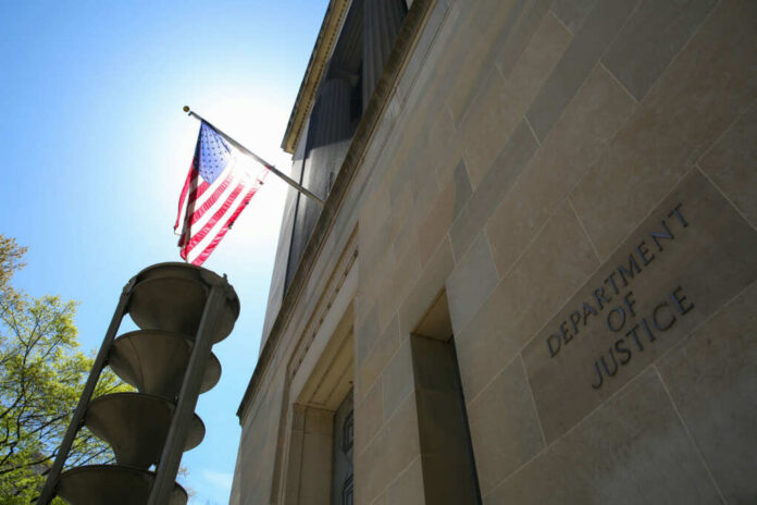 Department of Justice building with American flag