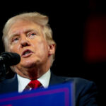 Trump’s Hardline Stance: Iran Must Pay More Man speaking at a podium with microphone