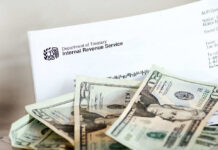 TRUMP’s $10B IRS Showdown – Taxpayer Heist? IRS letter with scattered U.S. dollar bills.