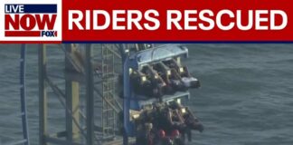 WATCH: Crews rescue riders stuck on roller coaster in Texas