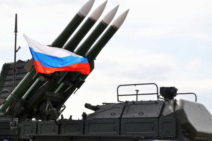 missiles-launcher314643821jpg Military launcher with four missiles and Russian flag