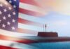 A submarine partially submerged in the ocean with an American flag overlay