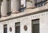 Facade of the Department of the Treasury with columns and engraved text
