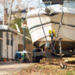 Driveway Heist Ends With a Shock Twist A boat on a trailer parked in a residential area