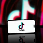 Smartphone displaying TikTok logo on screen