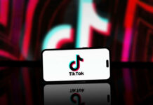 Smartphone displaying TikTok logo on screen