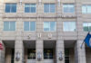 Mass Deportations: Truth or Political Smoke? US Immigration and Customs Enforcement building entrance flags