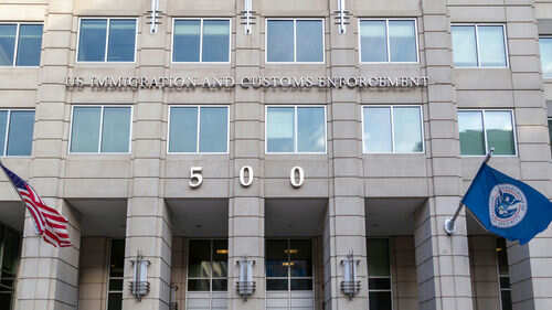 US Immigration and Customs Enforcement building entrance flags