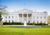 The White House with lawn and fountain.