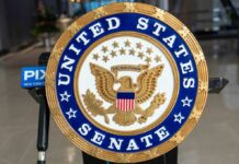 United States Senate seal on a podium