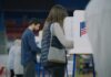 Who Votes Now? LA Drops The Guardrails A person casting their vote at a polling station