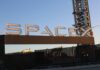 Sign displaying the SpaceX logo at a launch site