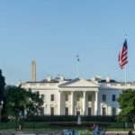 The White House with the Washington Monument in the background