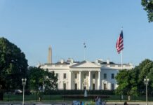 The White House with the Washington Monument in the background