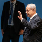 I dont know who this person is waving