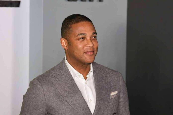 shutterstock_1549227494 man in gray suit smiling at event