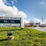 Canada border inspection sign at roadside checkpoint