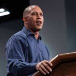 Jeffries Defends Israel Aid As Democrats Divide Man speaking at a podium