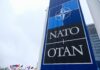 Europe Dumps Boeing For Radar Edge NATO sign with flags in the background