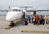 When A Six-Pack Becomes A Constitutional Crisis Passengers boarding a small aircraft at an airport
