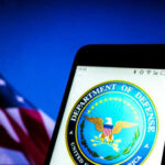Department of Defense logo on smartphone screen flag